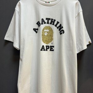 A BATHING APE-BAPE Gold with Monogram Head Logo Tee